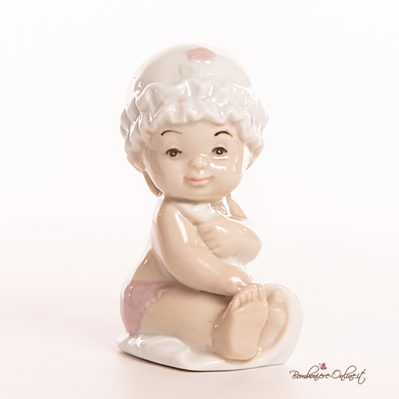 Bomboniere Morena: Bimba neonata seduta con Cuffietta